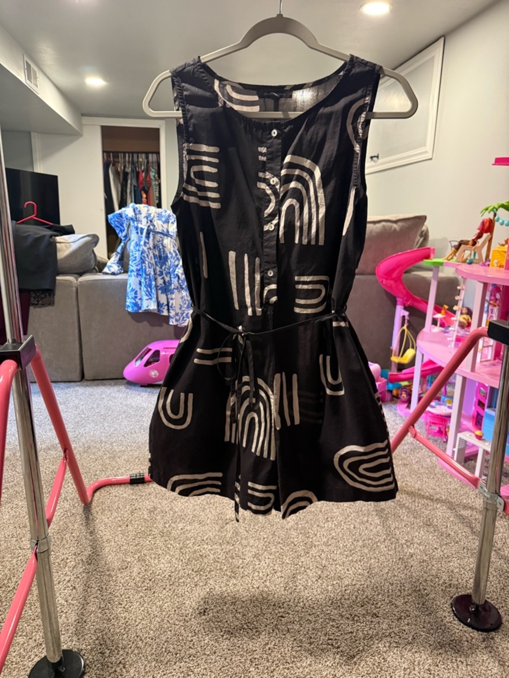 Sleeveless Black Romper with Beige Abstract Print